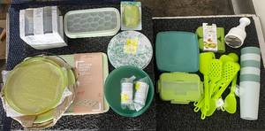 lot 394 image: Assorted Kitchenware Collection with Utensils, Baking Sheet, Plates, and Storage Containers