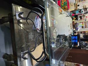 lot 28 image: Two iron and glass end tables with a coffee table. all matching