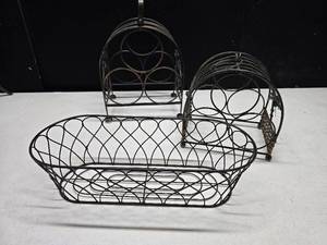 lot 51 image: Wine bottle holders and metal basket