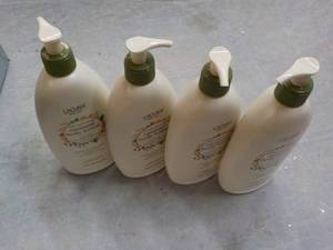 lot 174 image: 4 Bottles Oatmeal Body Lotion 18 oz...