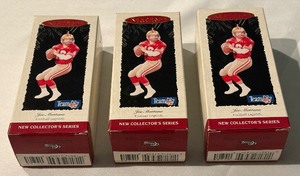 lot 75 image: (3) Joe Montana Hallmark Christmas Ornaments
