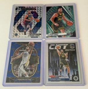 lot 32A image: (4) Steph Curry Basketball Card Lot