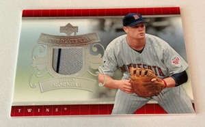 lot 44A image: Jusin Morneau Game-Used Relic 2007 Upper Deck Game Materials #UD-MO Minnesota Twins Baseball Card