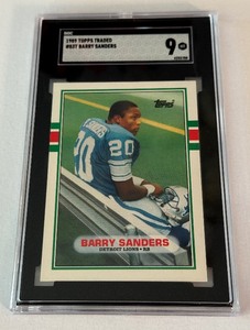 lot 47A image: Barry Sanders SGC 9 MT RC 1989 Topps Traded #83T Rookie Football Card
