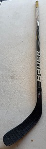 lot 209 image: David Grun Team Issued  Used Bauer Hockey Stick - Minnesota Duluth