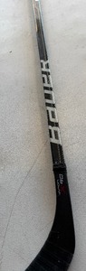 lot 210 image: Marc Bureau Team Issued  Used Broken Sher-Wood Hockey Stick - Minnesota North Stars