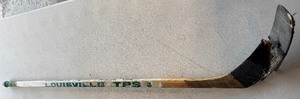 lot 211 image: Doug Smail Team Issued  Used Broken Louisville Vintage Gockey Stick - Minnesota North Stars