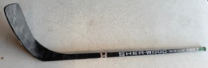 lot 213 image: Marc Bureau Team Issued  Used Sher-Wood Hockey Stick - Minnesota North Stars