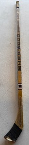 lot 221 image: Brian Bellows Team Issued  Used Broken Sher-Wood Hockey Stick - Minnesota North Stars