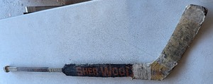 lot 225 image: Robb Stauber Team Issued  Heavily Used Sher-Wood Goalie Hockey Stick - University of Minnesota