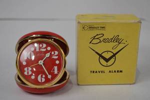 lot 22 image: Vintage Bradley Travel Alarm Clock with Original Box, Red