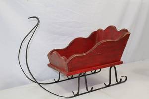 lot 131 image: Red Wooden Christmas Sleigh Holiday Decor with Metal Runners