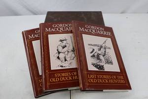 lot 156 image: Gordon MacQuarrie Old Duck Hunters Stories 3 Volume Set with Slipcase