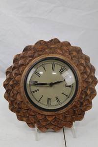 lot 250 image: Rustic Carved Wood Wall Clock with Petal Motif, 11 in.