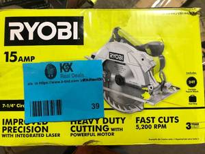 lot 39 image: RYOBI 15 Amp Corded 7-14 in. Circular Saw with EXACTLINE Laser Alignment System, 24T Carbide Tipped Blade, Edge Guide and Bag   Customer Returns See Pictures