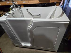 lot 3 image: Hydro Dimensions EAS Dual Walk-In Tub with Jets and Controls - Working Condition When Removed