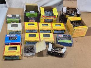 lot 15 image: Boxes of Various Nails and Fasteners like Stormguard and Grip Rite