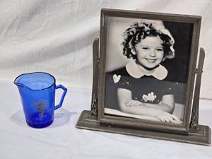 lot 23 image: Shirley Temple Cobalt Creamer Pitcher and Framed Photograph