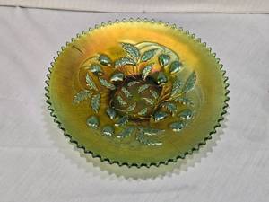 lot 40 image: Carnival Glass Strawberry Pattern Iridescent Bowl With Scalloped Edge Basketweave Back  - from Northwood
