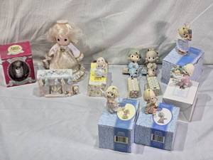 lot 52 image: Precious Moments Collectibles Holiday Ornaments and Tree Topper