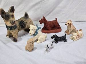 lot 58 image: Lot of Ceramic Dog Figurines and Statues Including Scottie Dog with Hurt Paw