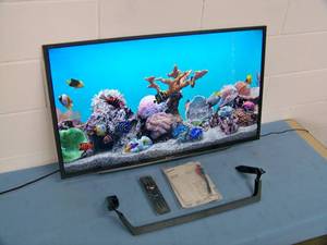 lot 67 image: Sony 40 Full HD LED Backlit LCD SMART TV  Television KD-40W650D with Remote Control and Stand
