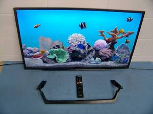 lot 102 image: Sony 40 Full HD LED Backlit LCD SMART TV  Television KD-40W650D with Remote Control and Stand