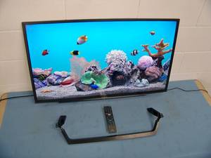 lot 103 image: Sony 40 Full HD LED Backlit LCD SMART TV  Television KD-40W650D with Remote Control and Stand