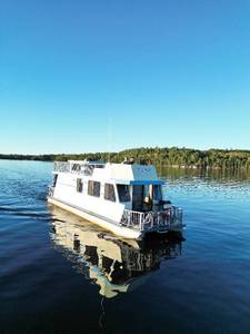 lot 1 image: 44 Houseboat (6-8 Guests) May 11th-14th, 2026