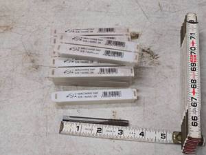 lot 236 image: Lot of (13) 38-16 UNC 2B 3 Flute Machine Tap (in original packaging)