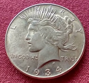 lot 13 image: 1934 Peace Dollar - Tough Date