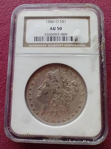 lot 24 image: 1886-O Morgan Dollar - NGC AU50