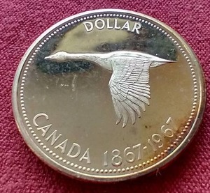 lot 32 image: 1967 Canada Silver Dollar
