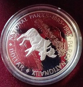lot 102 image: 1985 Canada National Parks Silver Dollar