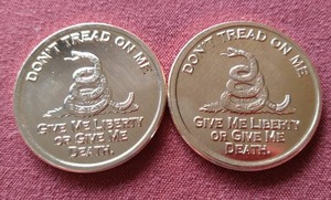 lot 104 image: (2) Dont Tread on Me 1 oz Copper Rounds
