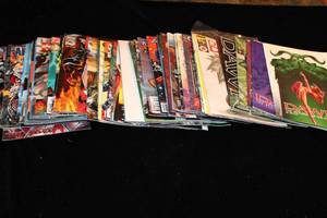 lot 9 image: Assorted Comic Book Collection with Dawn, Aria, Embrace, Spawn, and More