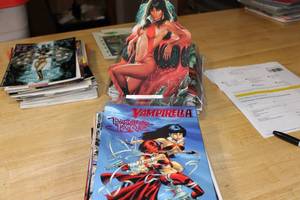 lot 34 image: 30  Vampirella Comics including cut out