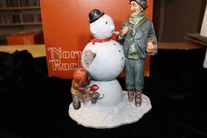 lot 90 image: Norman Rockwell Porcelain Figurine Winter Snow Sculpture Four Seasons