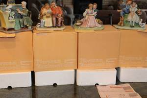 lot 98 image: Set of 4 Norman Rockwell Inspirations in Porcelain Four Ages of Love Figurines with Boxes