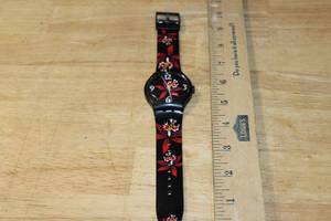 lot 117 image: Swatch Fleur Noir SUDB114 Floral Analog Watch
