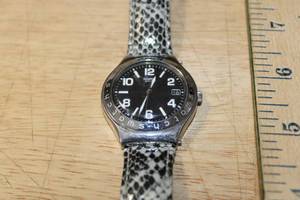 lot 122 image: Swatch YGS432 Snake Charmer Wristwatch with Black Snake Strap