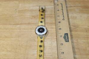 lot 124 image: Swatch GK275 Migraine Analog Wristwatch with Yellow Polka Dot Band