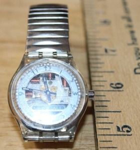 lot 128 image: Swatch Blue Through SLK110C Skeleton Watch with Stretch Band