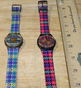 lot 131 image: Set of 2 Swatch Watches GB147 and GM109 Plaid Pattern