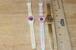 lot 133 image: Set of 3 Swatch Quartz Wristwatches Assorted Colors