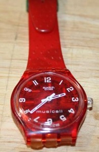 lot 184 image: Swatch Musical 1997 Red Rythm SLR102 Peter Gabriel Watch