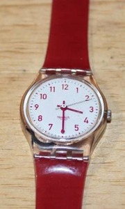 lot 198 image: Swatch LP117 Smoked Pink Wristwatch with Red Strap