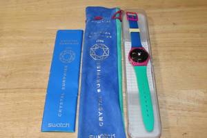 lot 201 image: 1994 Swatch Crystal Surprise Watch with Case and Bag