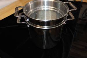 lot 219 image: All Clad Stainless Stock Pot and Strainer