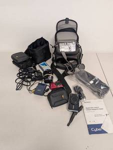 lot 15AM image: Lot of Digital Cameras Including Canon PowerShot, Sony Cyber-shot, Samsung with Accessories
